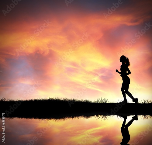 Fototapeta Naklejka Na Ścianę i Meble -  Silhouette of running girl