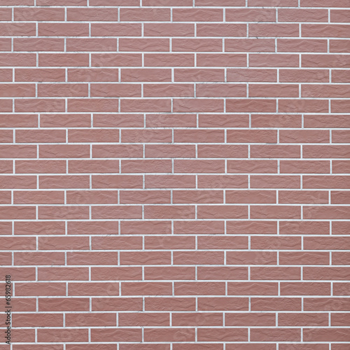 Closeup of red brick wall as background. Square format.