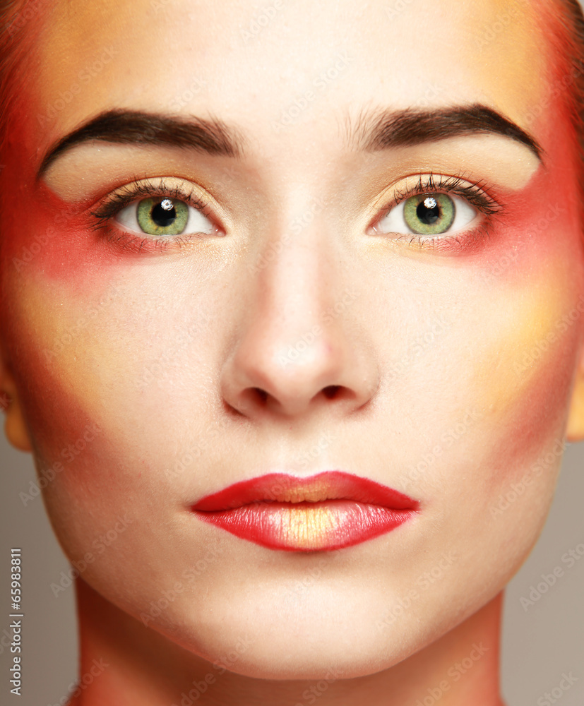 beautiful make up of bright lips, isolated on grey background beautiful make up of bright lips, isolated on grey background