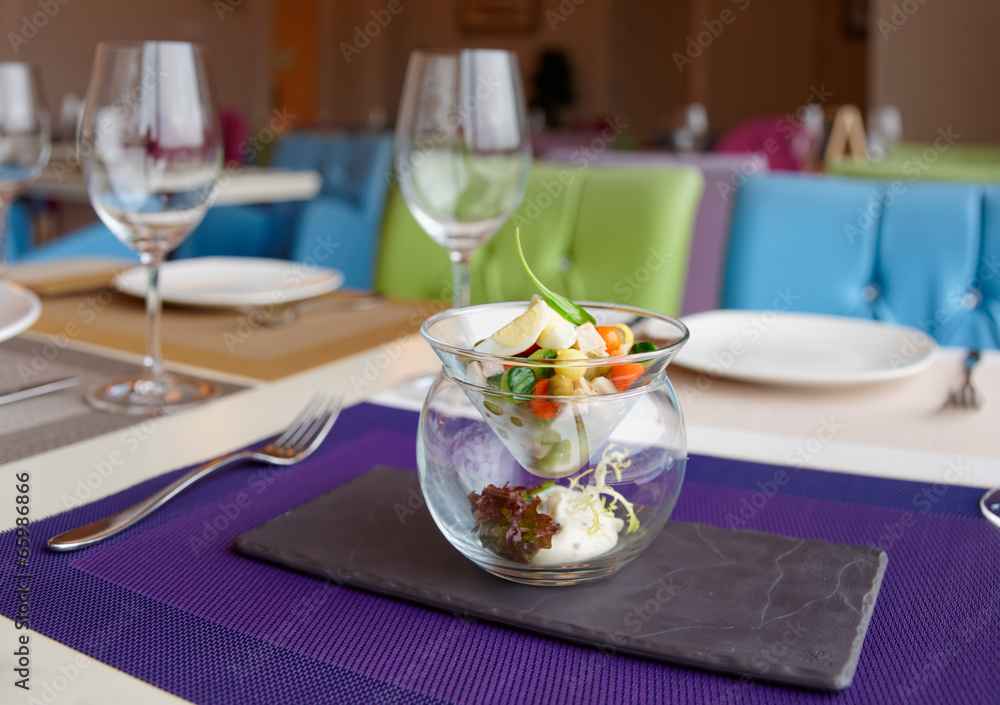 Russian salad in creative serving Russian salad in creative serving