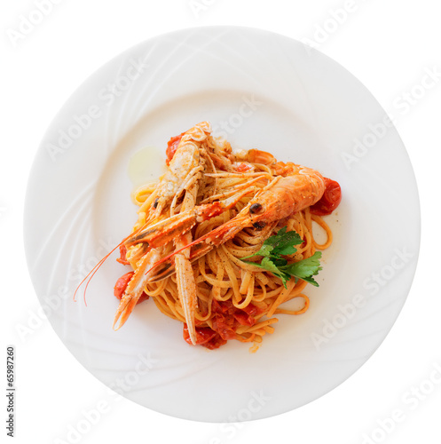 Pasta with tomato sauce and langoustines, isolated