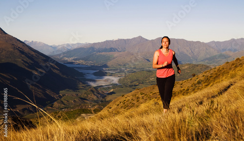 Woman Jogging In A Beautiful Mountain Scenic © Rawpixel.com