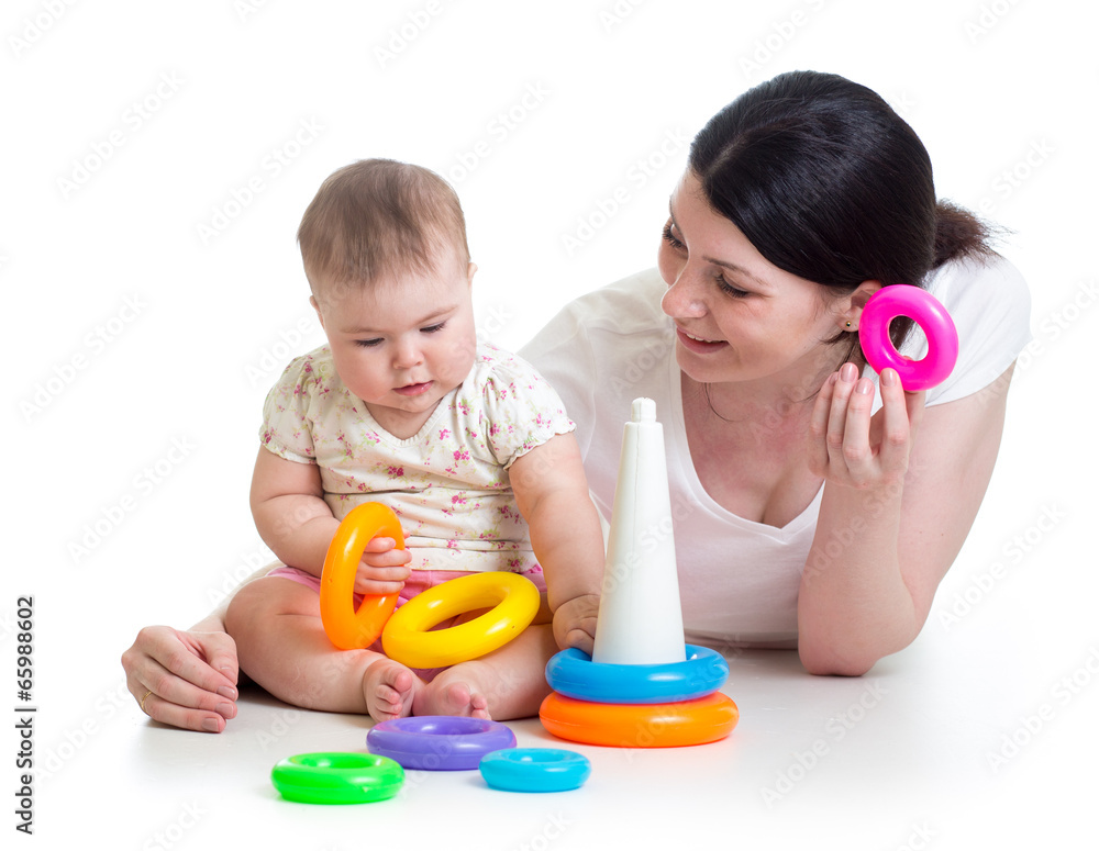 baby girl and mother playing together with toy baby girl and mother playing together with toy