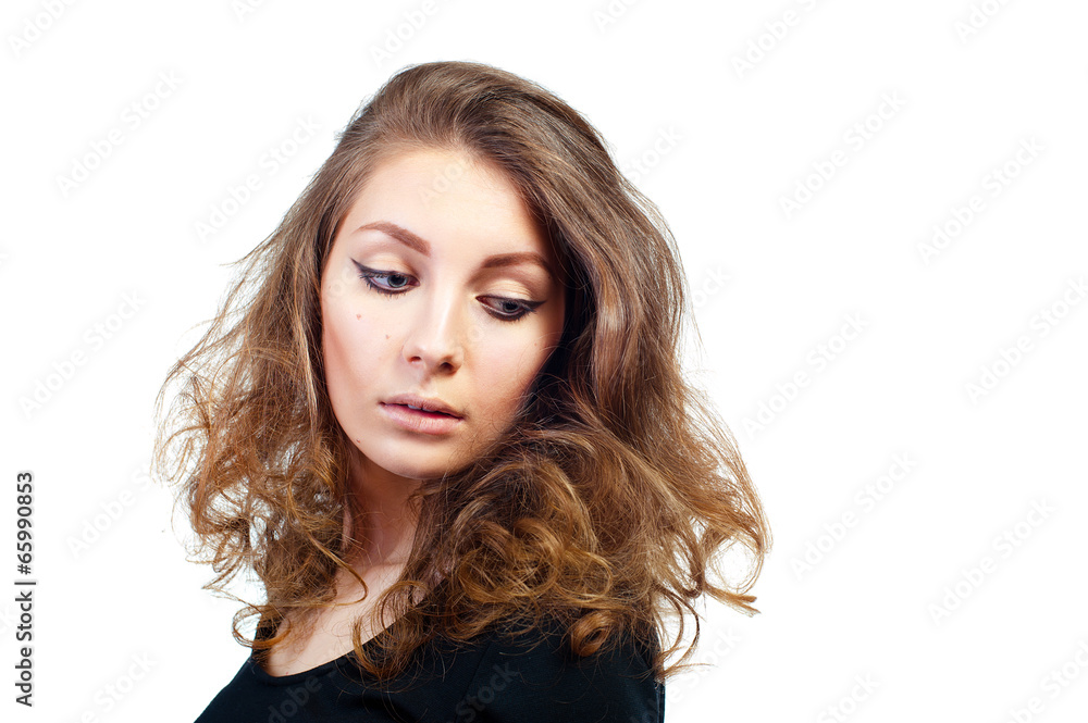 Beautiful young woman with evening make-up and volume hairstyle Beautiful young woman with evening make-up and volume hairstyle