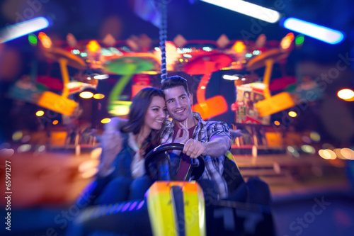 couple in bumper car - shoot with lensbaby photo