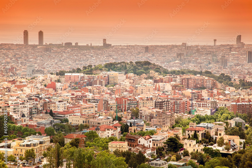 view of Barcelona from above at sunset in summer