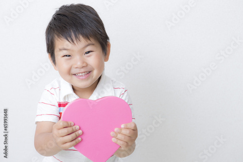 Obraz na płótnie ハートを持つ子供 w salonie
