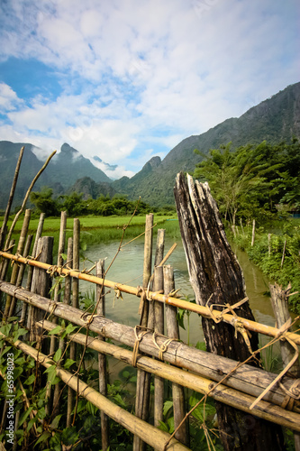 Obraz na płótnie Wooden Fence, Vang Vieng w salonie