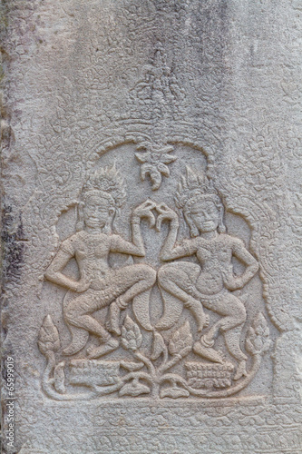 Two Apsaras on the wall of Angkor Wat © somjring34