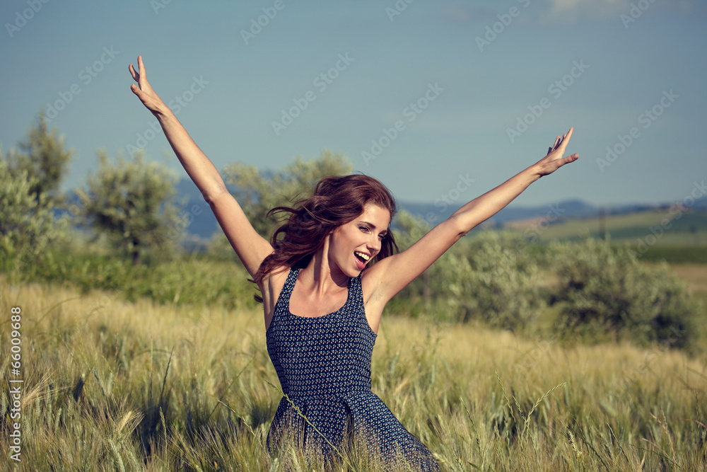 Woman in wheat field enjoying, freedom concept Woman in wheat field enjoying, freedom concept