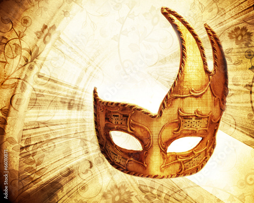 Book page with venetian mask