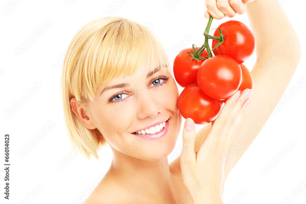 Woman holding tomatoes