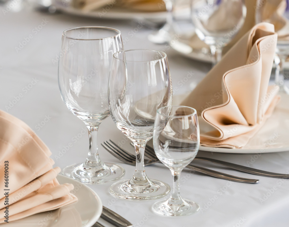 Served with a plate and glasses on the table Served with a plate and glasses on the table