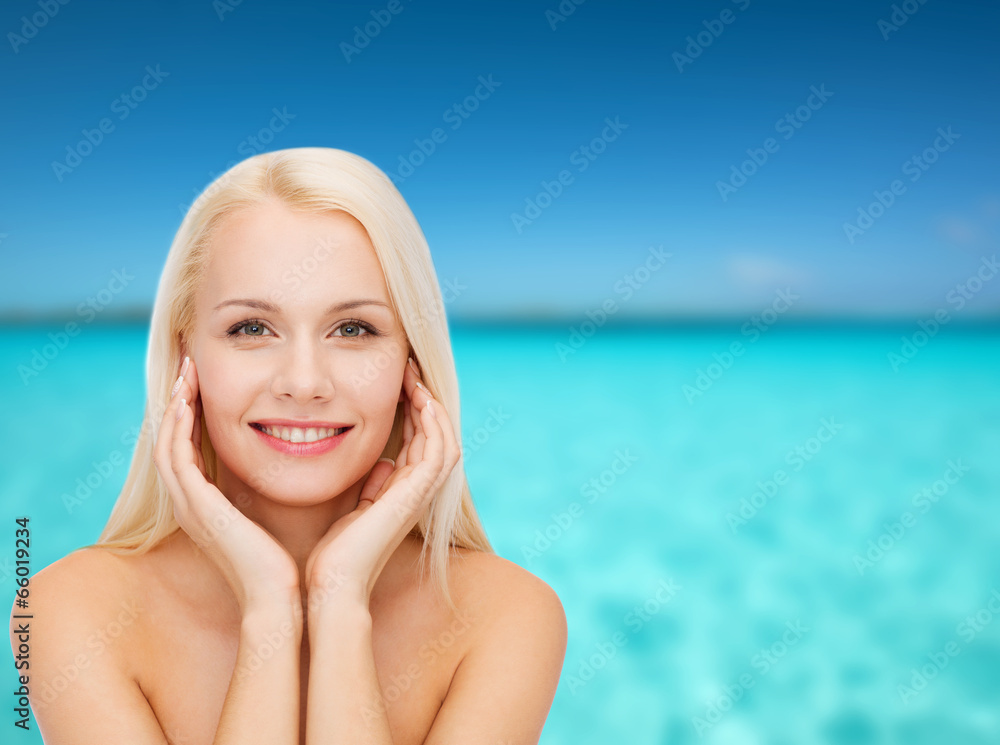 face of beautiful woman touching her face skin face of beautiful woman touching her face skin