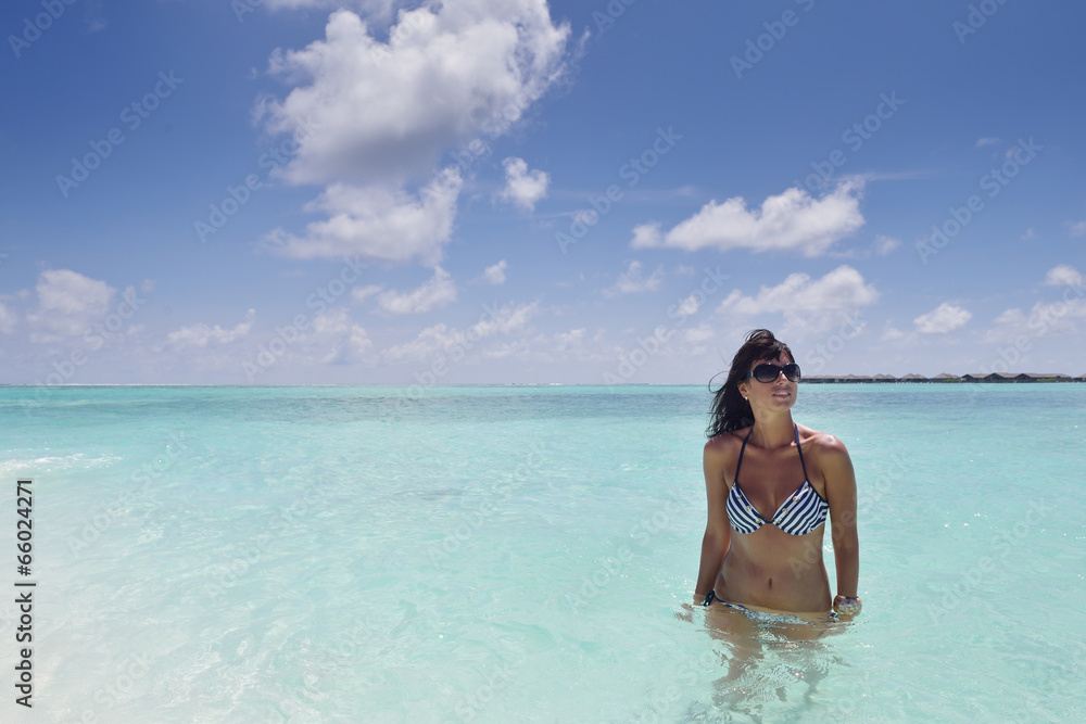 beautiful young woman on beach have fun and relax beautiful young woman on beach have fun and relax