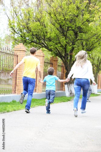Happy family, walk in the park