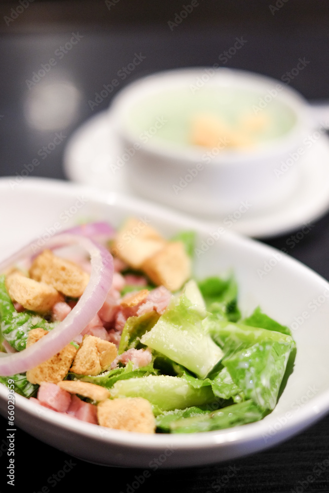Closed up cropped bowl of caesar salad Closed up cropped bowl of caesar salad