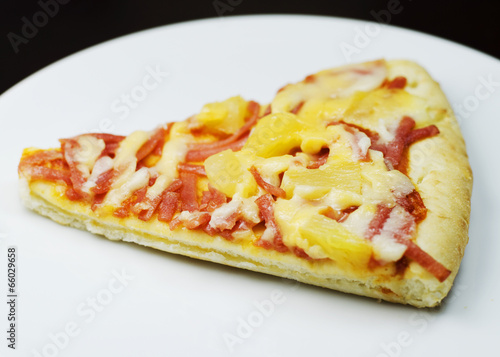 Close up of Pizza Hawaiian piece