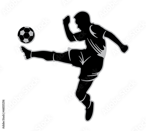 silhouette of a footballer beating on a ball