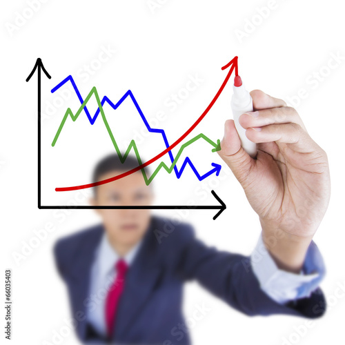 Businessman look up and writing contrast graph correlate raise u photo