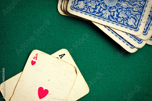 Photography antique cards on green casino table