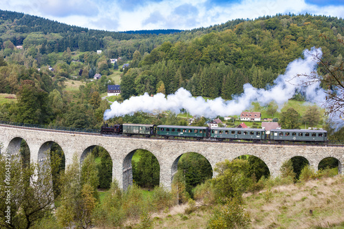 steam train on viaduct Novina, Krystofovo Valley, Czech Republic