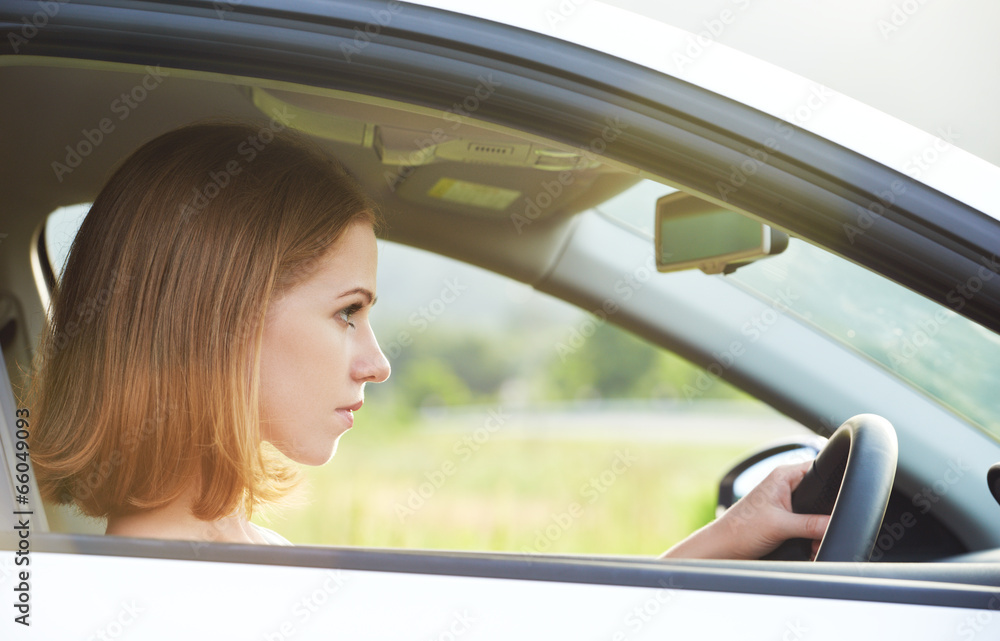 female driver driving a car female driver driving a car