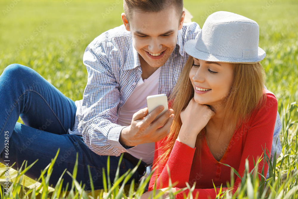 Fototapeta premium Couples with mobile phone
