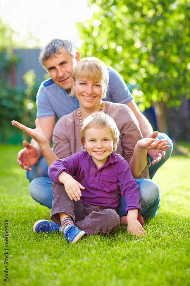 Fototapeta premium happy family having fun in summer garden