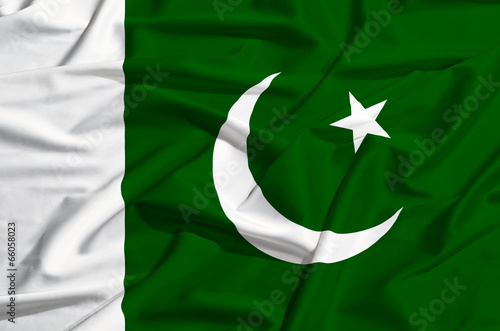 Pakistan flag on a silk drape waving