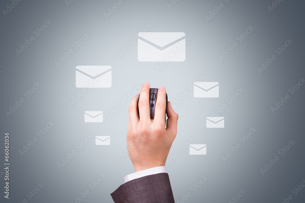 Businessman Hand Holding Mouse with Mail Symbols Businessman Hand Holding Mouse with Mail Symbols