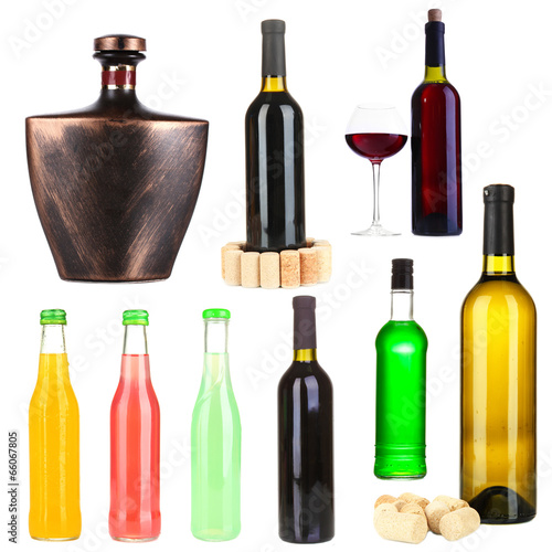 Collage of different alcohol bottles isolated on white