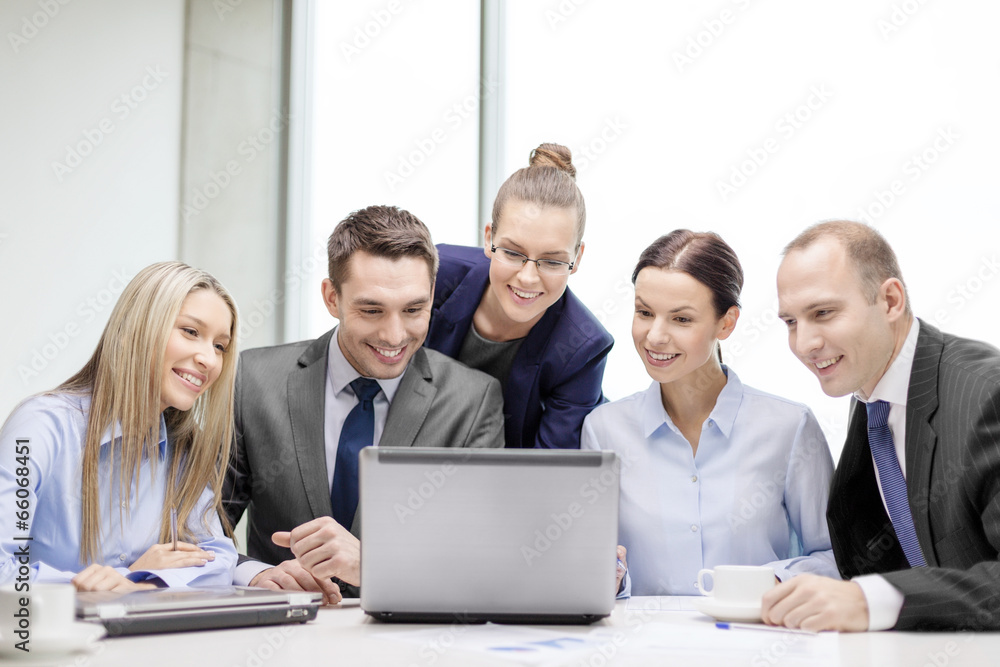 business team with laptop having discussion business team with laptop having discussion