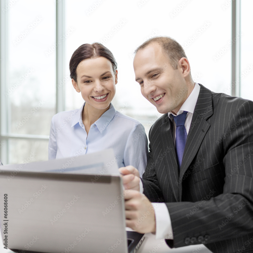businessman and businesswoman having discussion