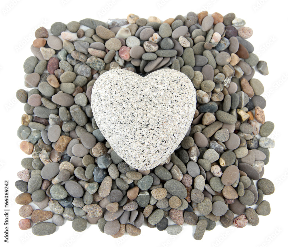 Heart on small sea stones, isolated on white Heart on small sea stones, isolated on white