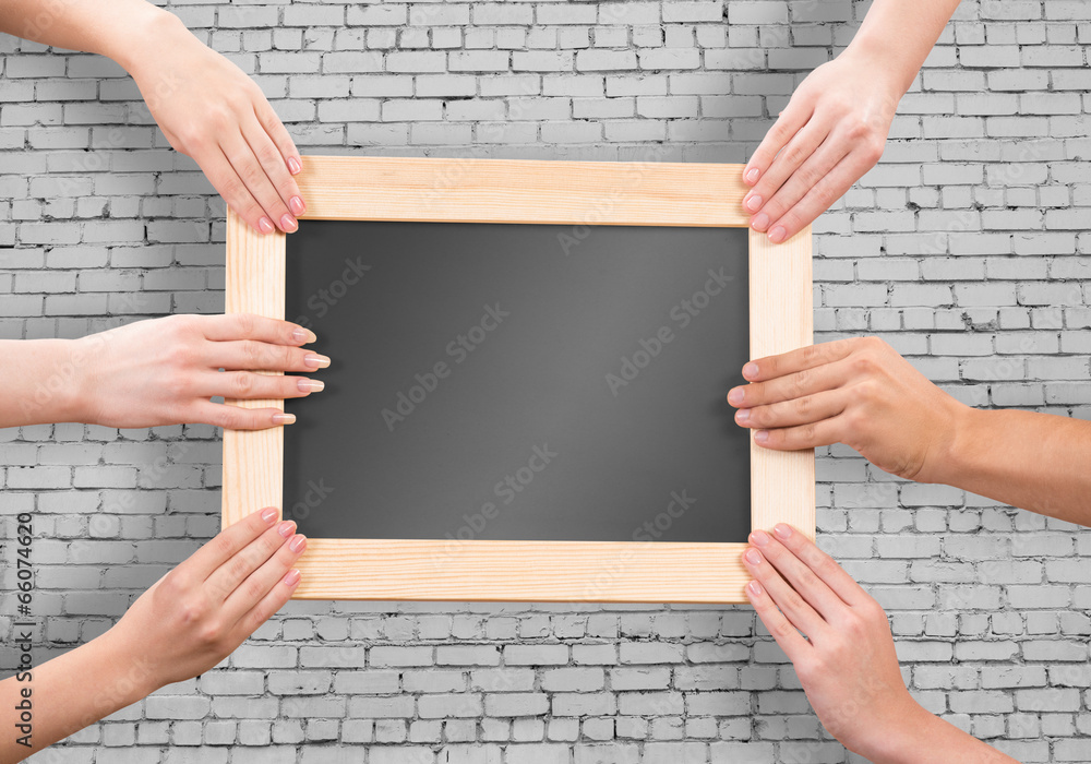 Hands holding frame Hands holding frame