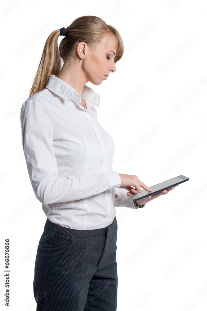 Businesswoman standing reeding holding tablet black Businesswoman standing reeding holding tablet black