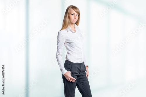 Portrait of young business woman white shirt black trousers Free Download Portrait of young business woman white shirt black trousers - GFXLoad