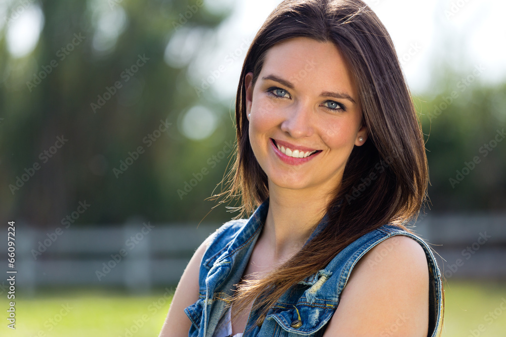 closeup portrait of cute young woman in the park closeup portrait of cute young woman in the park