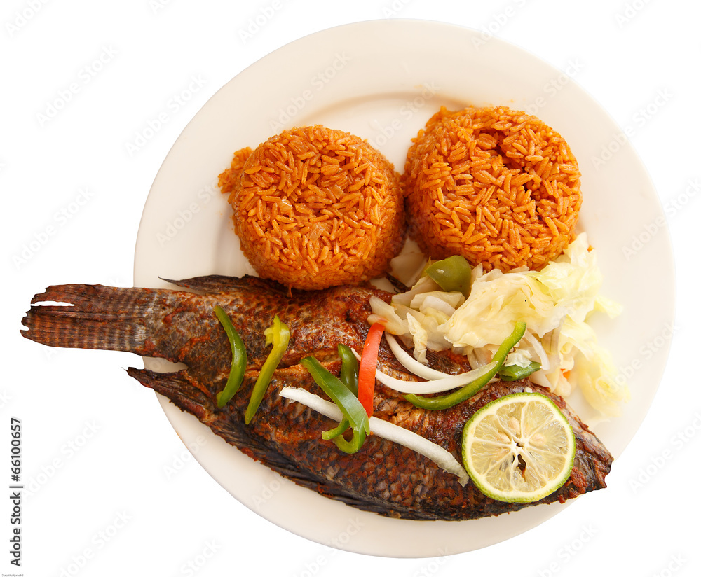 Jollof rice, popular food of Ghana with Tilapia famous local fish Stock