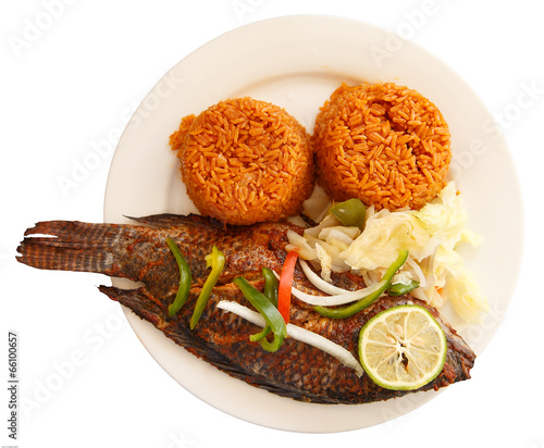 Jollof rice, popular food of Ghana with Tilapia famous local fish