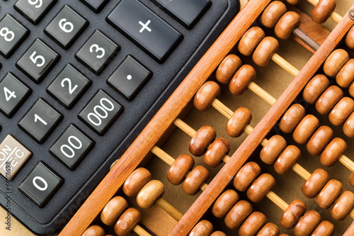 Modern calculator and abacus photo
