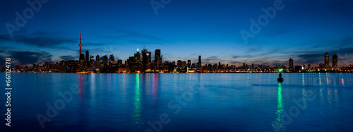 Toronto skyline panorama over lake © roxxyphotos