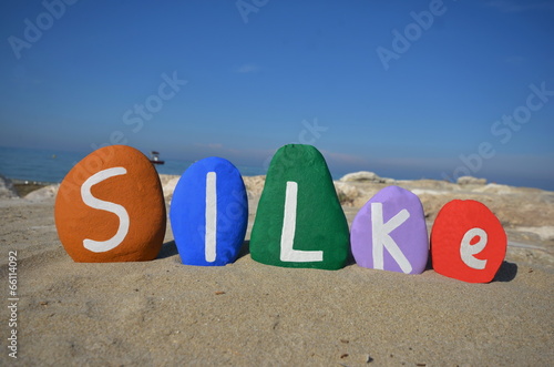 Silke, germanic female meaning name on stones photo