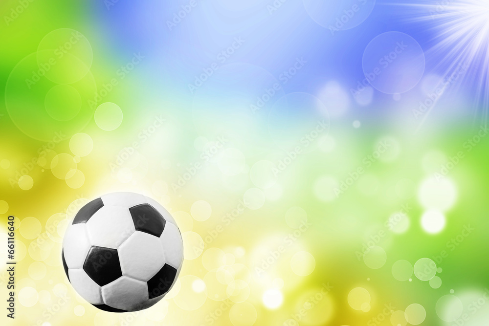 Fototapeta premium Soccer ball and the colors of the Brazil flag