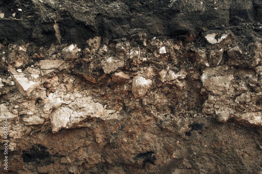 Layers of sand and stones under the asphalt. Layers of sand and stones under the asphalt.