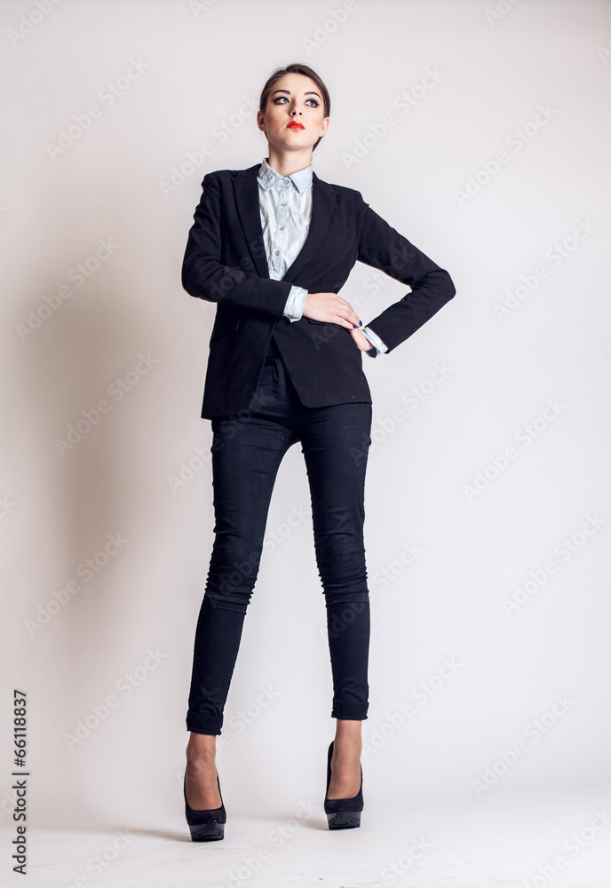 Fullbody business woman smiling isolated over a white Fullbody business woman smiling isolated over a white