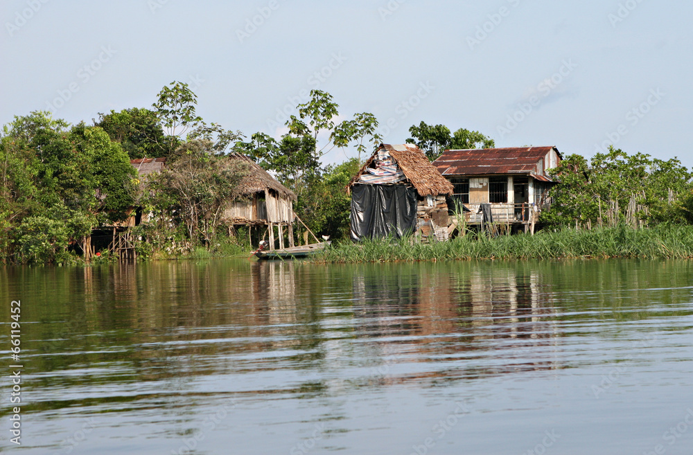 Houses on stilts rise above the polluted water in Belen, Iquitos