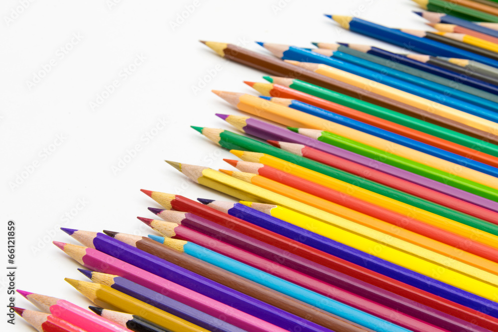 set of colored pencils on white table set of colored pencils on white table