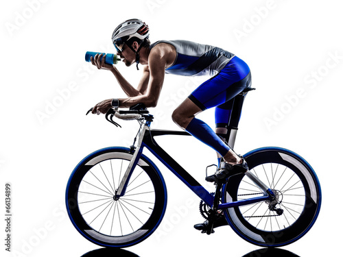 man triathlon iron man athlete cyclist bicycling drinking